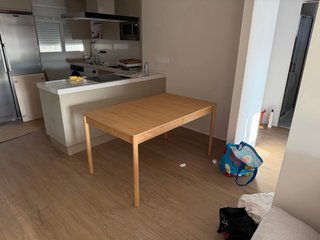 Mesa de comedor extensible de madera