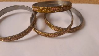 Pulseras estilo pakistaní doradas y rosas