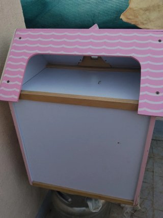 Casa de muñecas de madera rosa