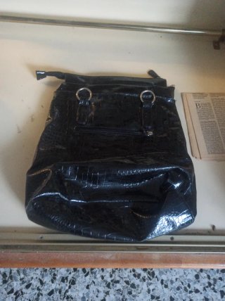 Bolso de mano negro de fiesta