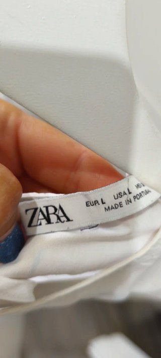 Blusa Zara blanca con volante