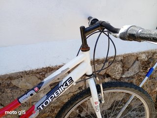 Bicicleta TOPBIKE roja y blanca