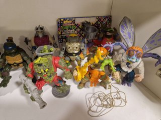 23 Muñecos Tortugas Ninja y 2 Vehículos