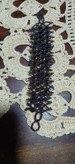 Bracciale perline nero e viola