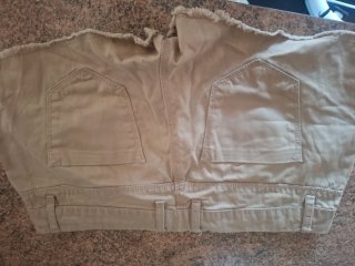 Shorts beige con rotos