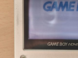 Nintendo Game Boy Advance SP Argento con caricabatterie