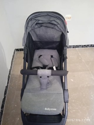 Carro de bebé gris