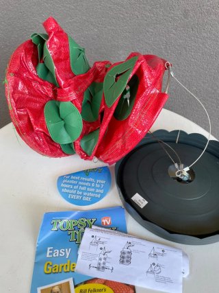 Cultivador colgante de fresas y hortalizas orgánic