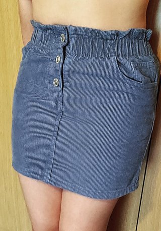Minifalda de pana azul con papelero