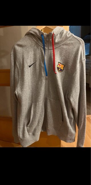 Sudadera Nike gris con logo FC Barcelona