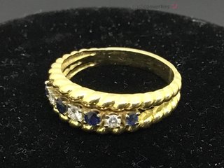 anillo oro 18k con piedra con diamante,zafiro