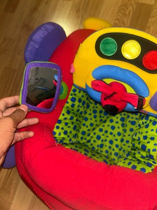 Cochecito de juego para bebé.