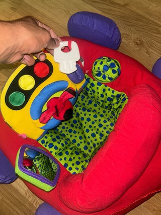 Cochecito de juego para bebé.