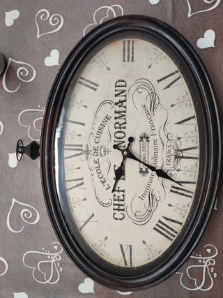 Orologio da parete ovale stile antico