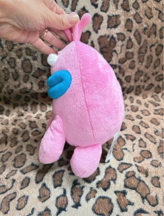 Peluche mostro blu, rosa e giallo