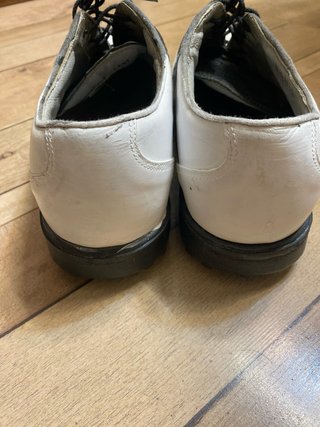 Nike: Zapatos de golf blancos y negros
