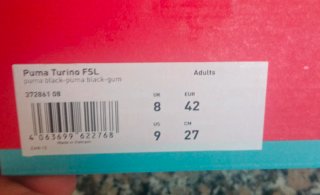 Zapatillas Puma Turino Negras y Doradas