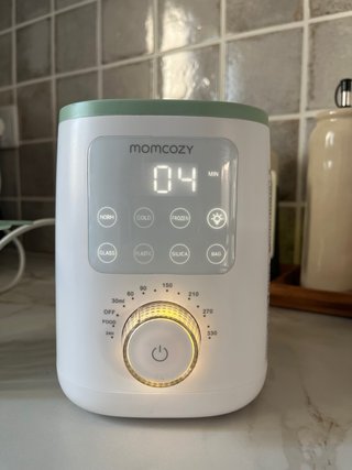 Calienta biberones Momcozy