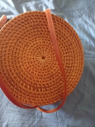 Bolso redondo tejido