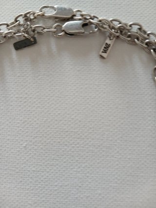 Collar doble Zara corazón y monedas