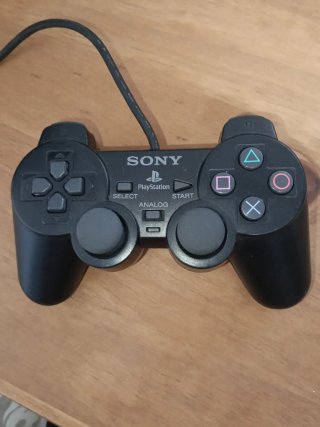 Consola PlayStation 2 con Mando y 13 Juegos