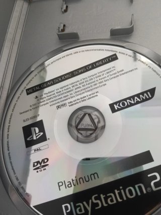 Consola PlayStation 2 con Mando y 13 Juegos