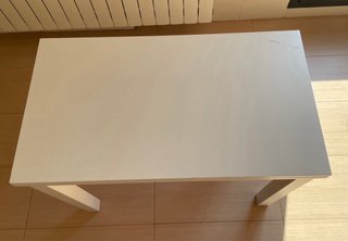 Mesa extensible Ikea blanca con 2 alas abatibles.