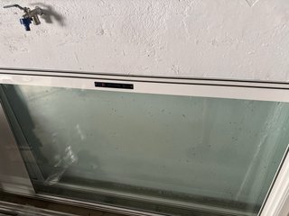 Ventana balconera con persiana medida 184x229x12