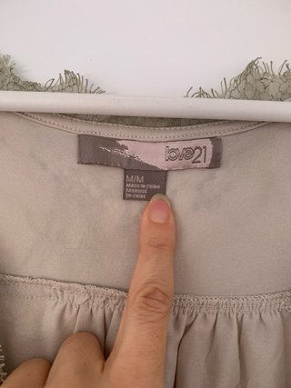 Blusa sin mangas encaje escote cruzado