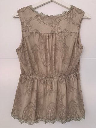 Blusa sin mangas encaje escote cruzado