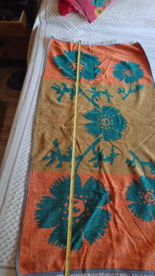 Toalla de playa floral naranja y verde azulado