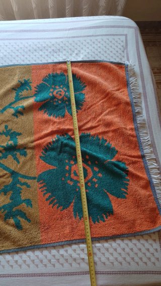 Toalla de playa floral naranja y verde azulado