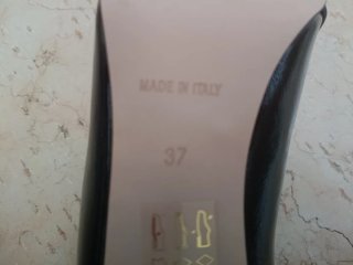 Tacchi Jaja neri con catena oro