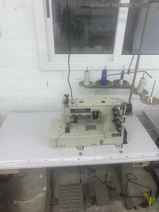 Maquina recubridora brother