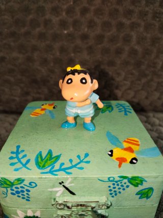 Caja verde Shin Chan
