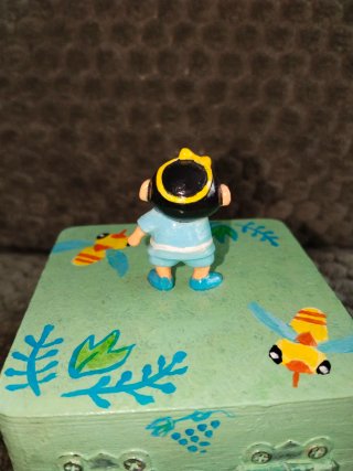 Caja verde Shin Chan