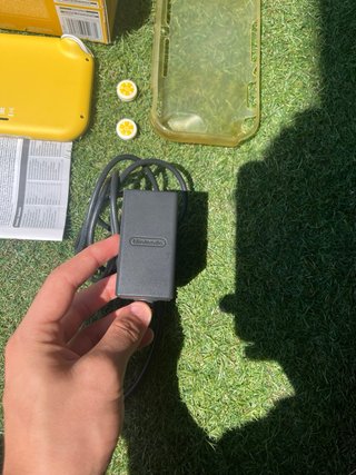 Nintendo Switch Lite Amarillo + Accesorios