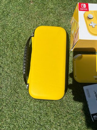 Nintendo Switch Lite Amarillo + Accesorios