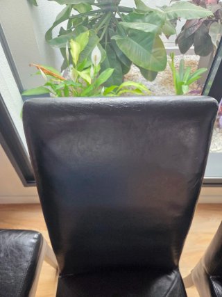 4 sillas de respaldo alto negras de piel sintética