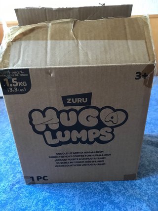 Muñeco Hug-a-Lump Jirafa Amarillo
