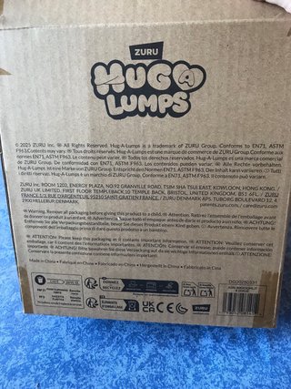 Muñeco Hug-a-Lump Jirafa Amarillo