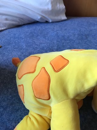 Muñeco Hug-a-Lump Jirafa Amarillo