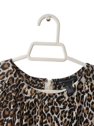 Blusa animal print beige y marrón