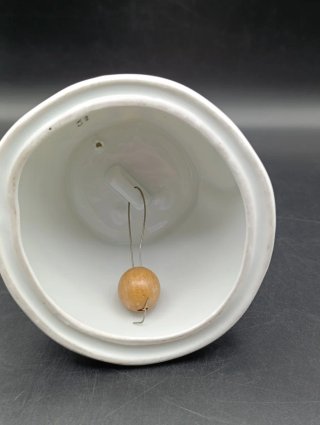 Figura campana porcelana Castro