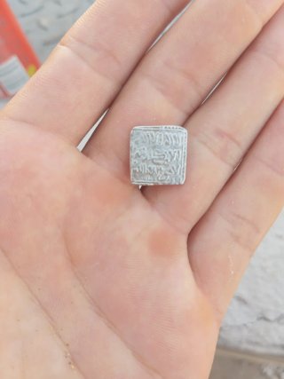 Moneda antigua de plata