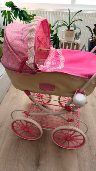 Carrito de bebé reborn rosa