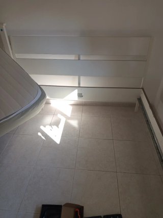 Cama de matrimonio blanca