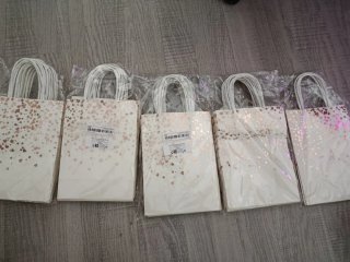 Bolsas de regalo papel dorado y blanco