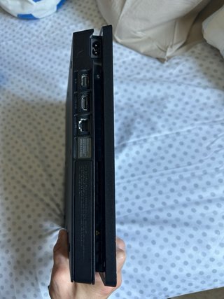PS4 (PlayStation 4) con 5 juegos