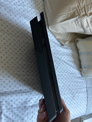 PS4 (PlayStation 4) con 5 juegos